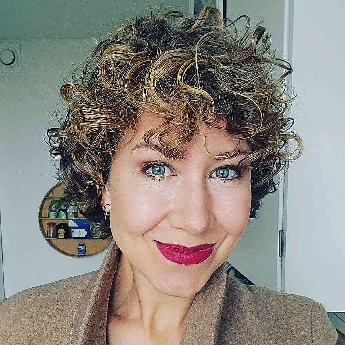 Short Blonde Highlighted Wispy Curls with Fringe