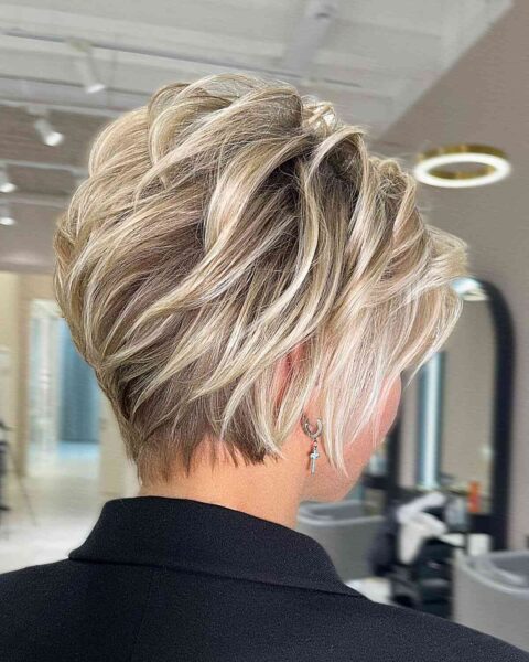 A Short Blonde Highlights on a Thick Pixie Cut