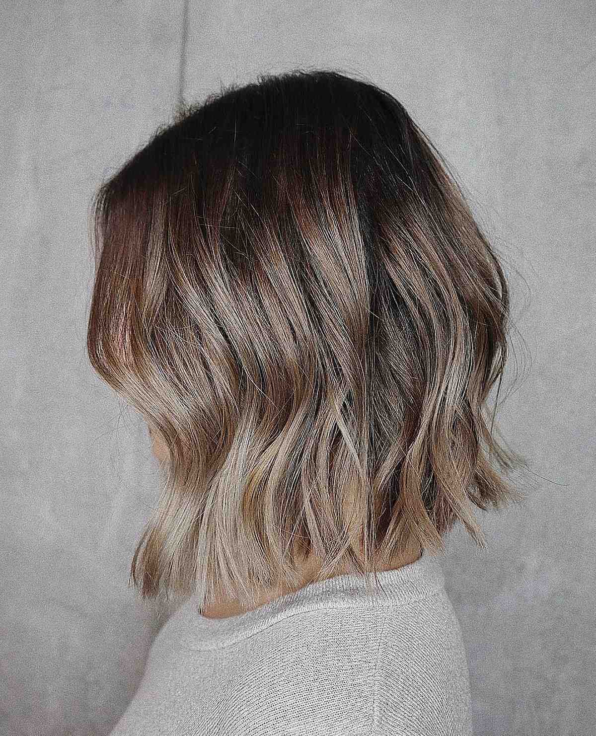 short blunt cut with honey blonde balayage highlights