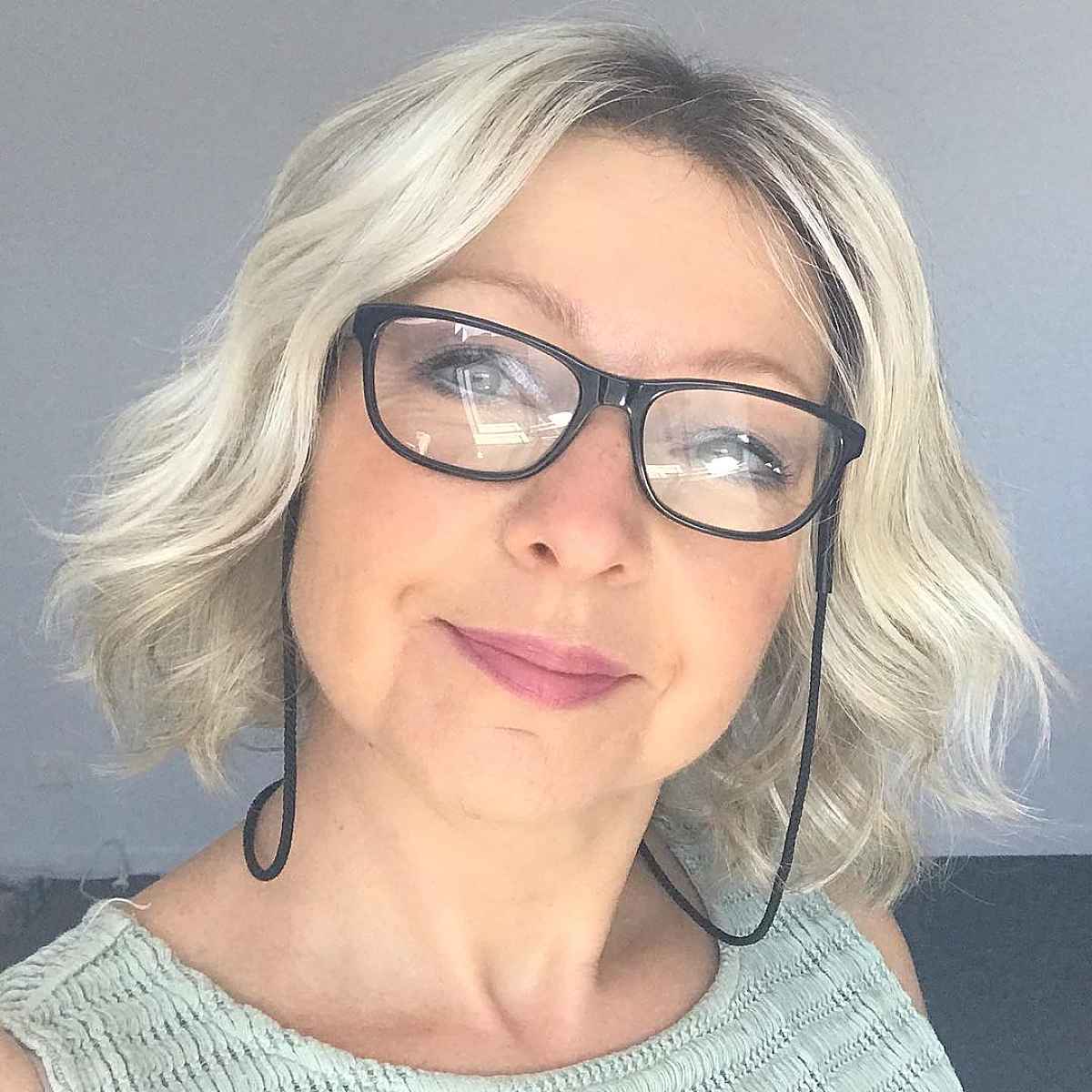 Short Bob for Older Women with Glasses and a Round Face