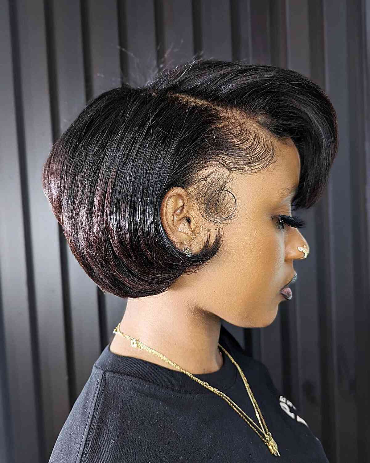 short bob hairstyle with side part for black woman