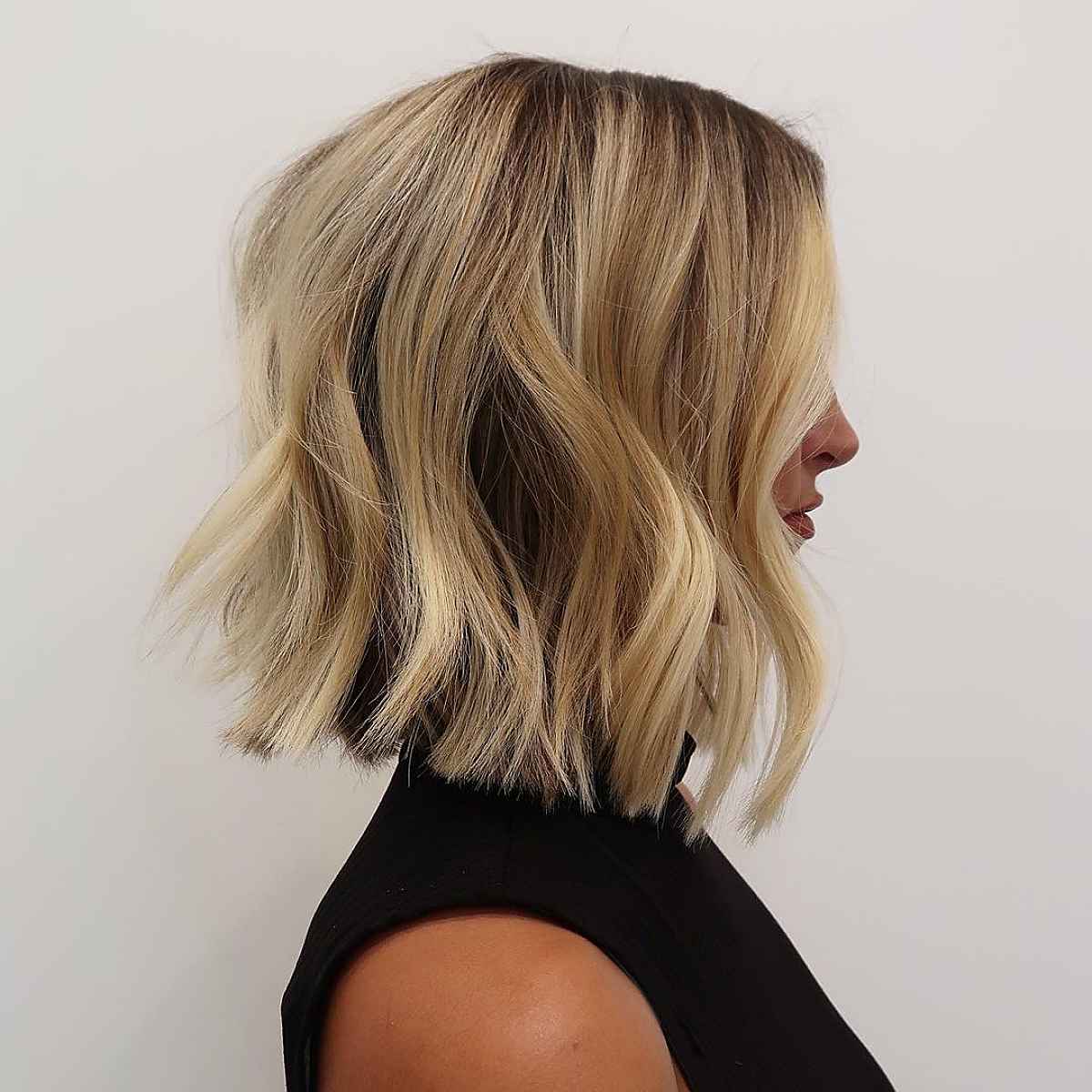 blonde short bob with flippy layers