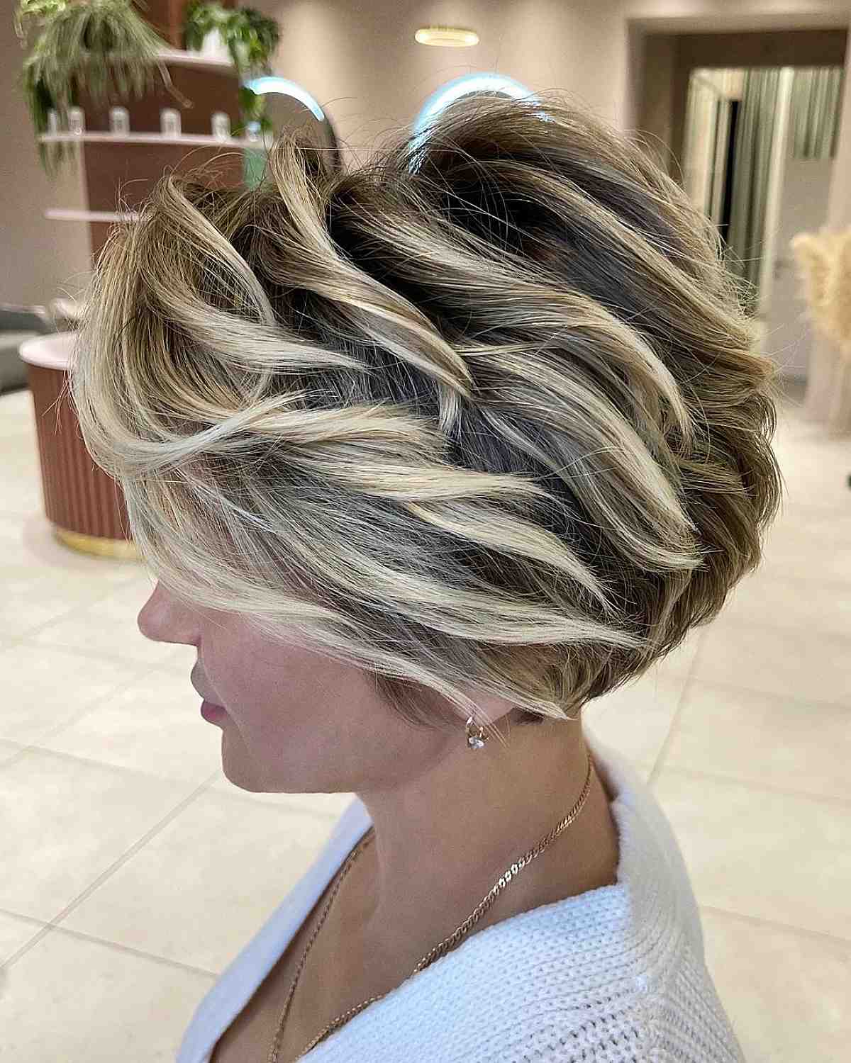 short brownish hair with blonde highlights