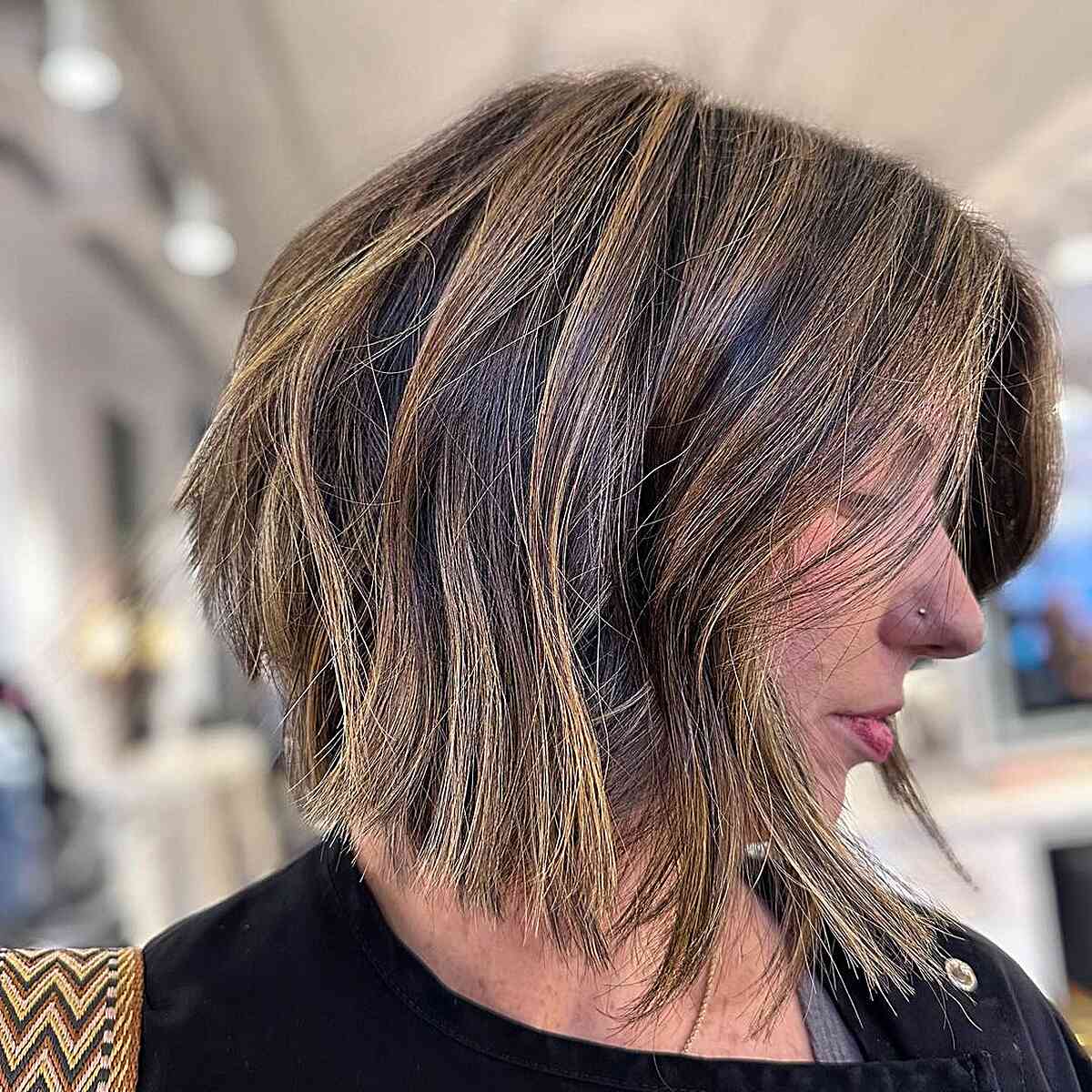 Short Brunette Choppy Inverted Angled Bob with Highlights