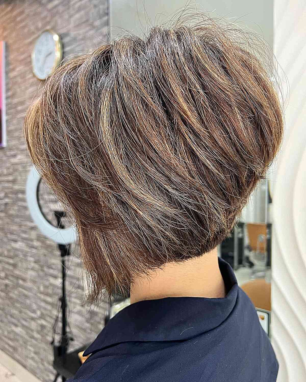 Short Choppy Concave Bob Cut with Stacked Layers
