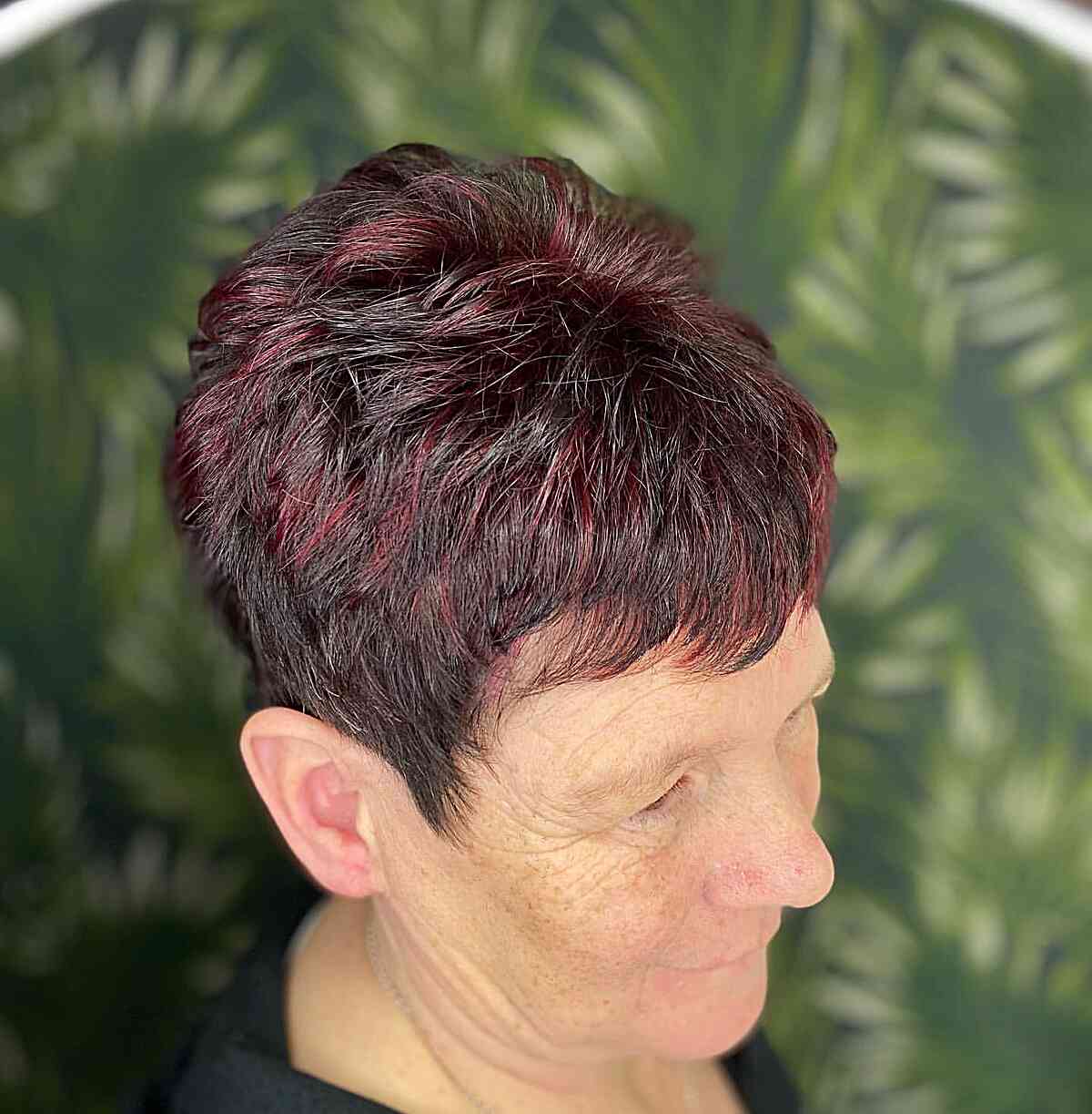 Short Choppy Pixie Hair with Red Highlights for Ladies Aged 70