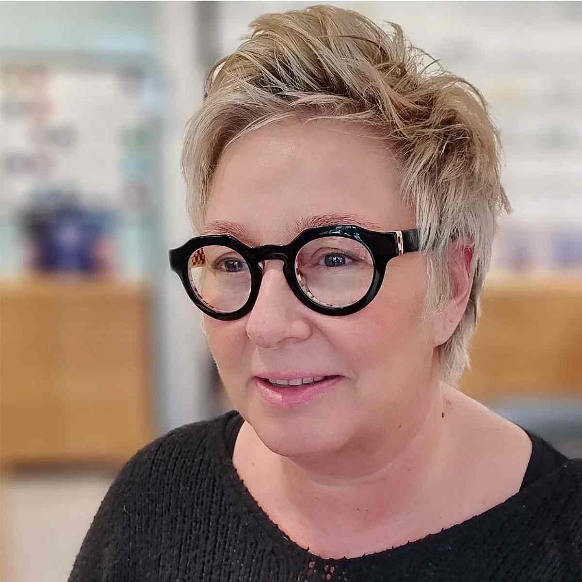 Short Choppy Pixie Quiff for ladies in their 50s with Round Glasses
