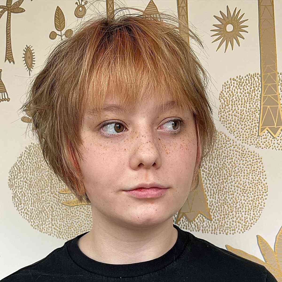 Short Choppy Razor Cut Bixie with Shaggy Layers and Bangs on Thin-Haired Women