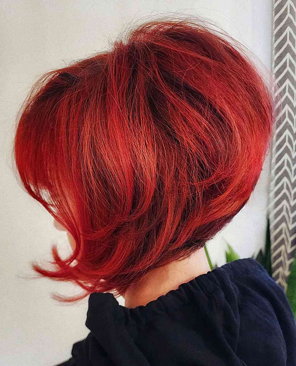 Short Classic Red Bob with layers and wispy ends