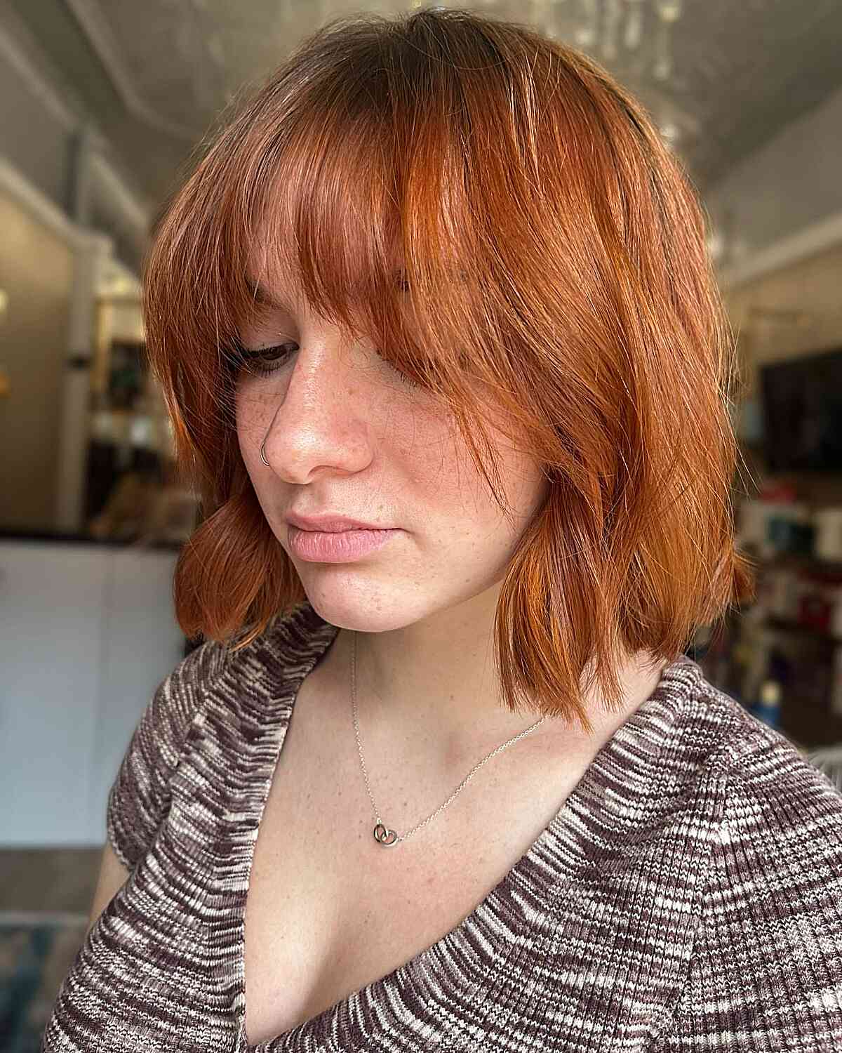 Short Copper Bob with Face-Framing Waterfall Fringe