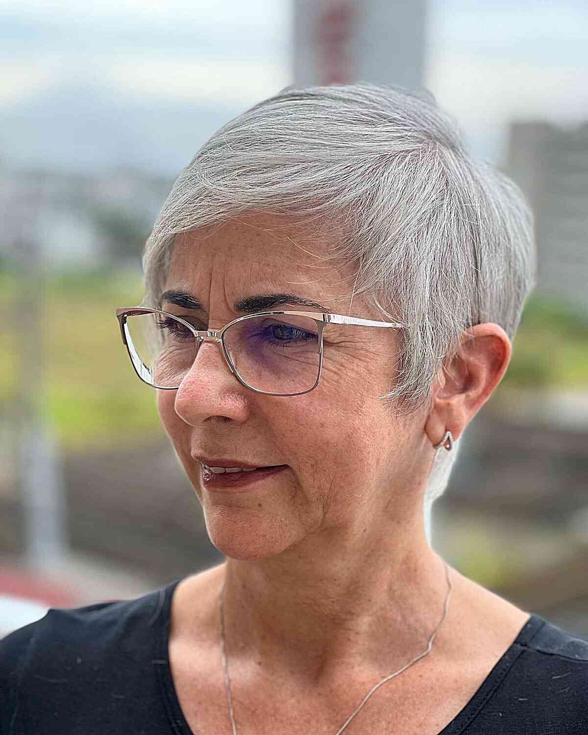 Short Crop Cut with Airy Bangs for 60-year-old Women with Glasses