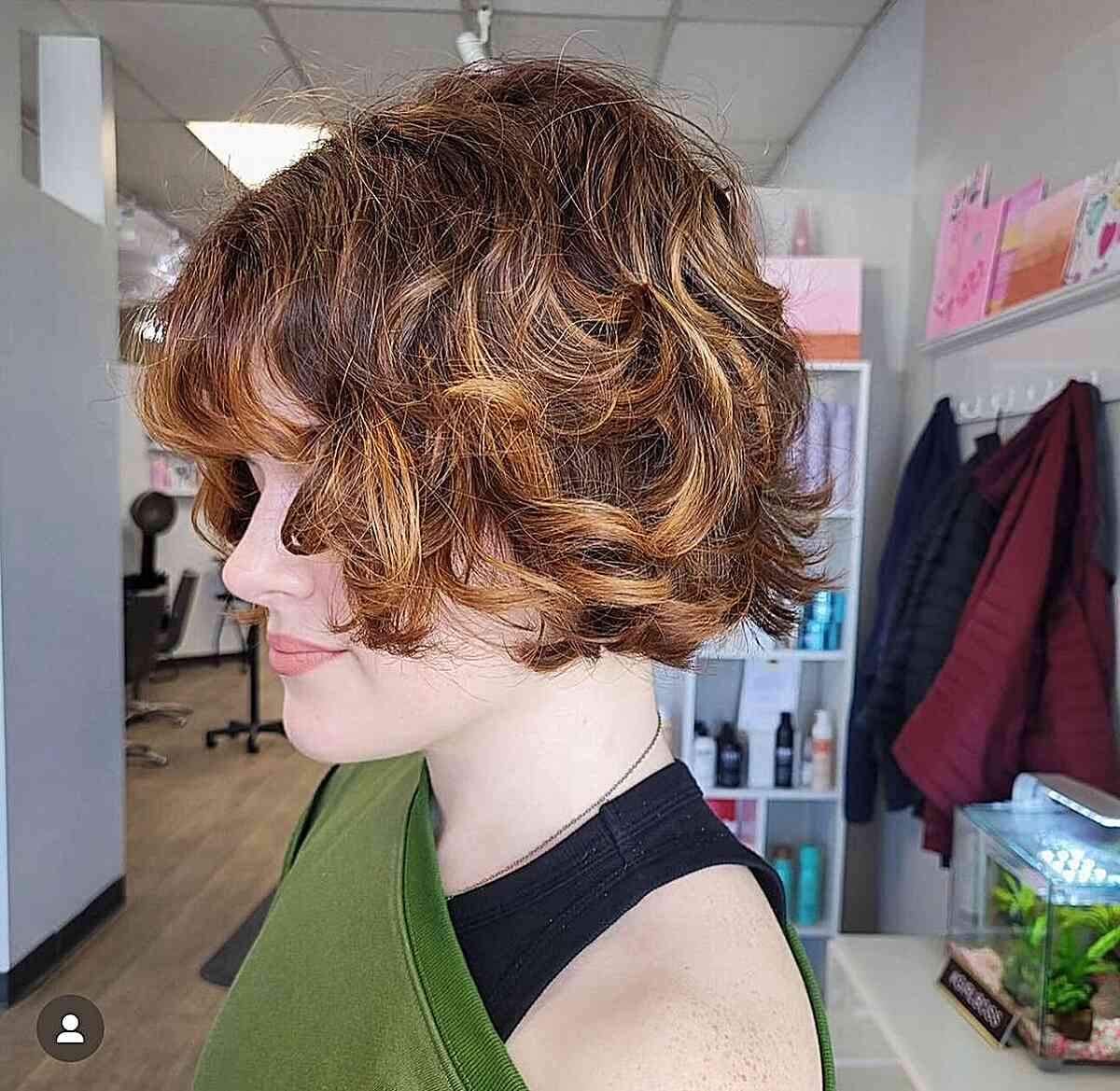 Short Curled French Bob with Blonde Highlights