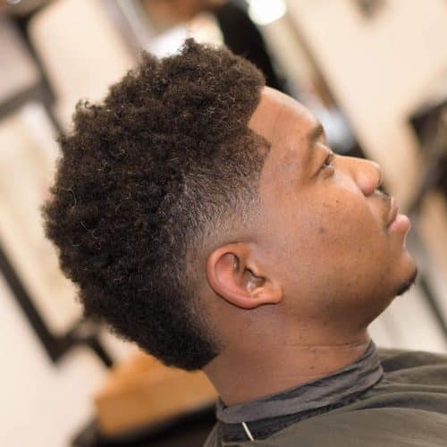 Old-school short curls with fade for black guys