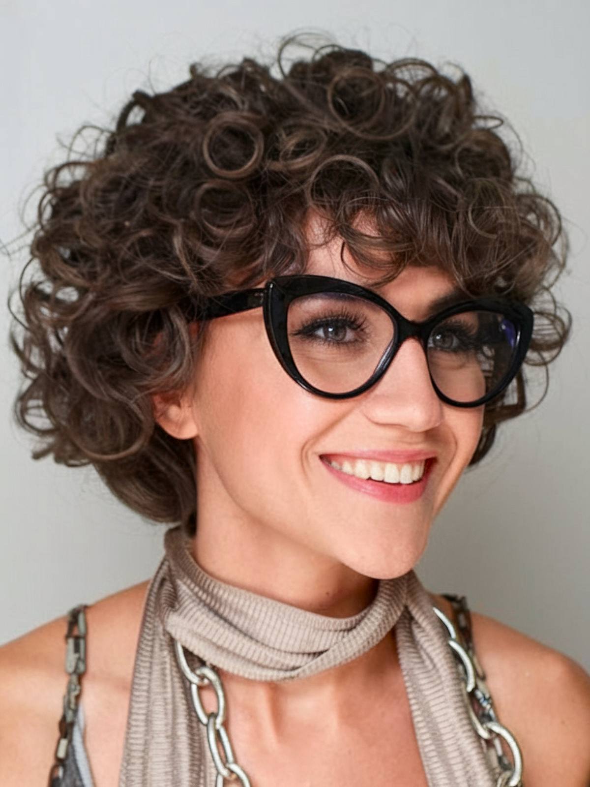 short curly haircut for women with glasses