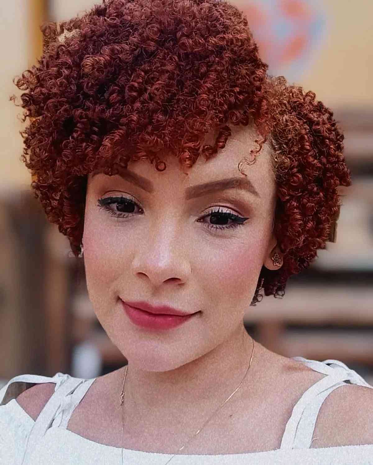 Short curly hair with side bangs