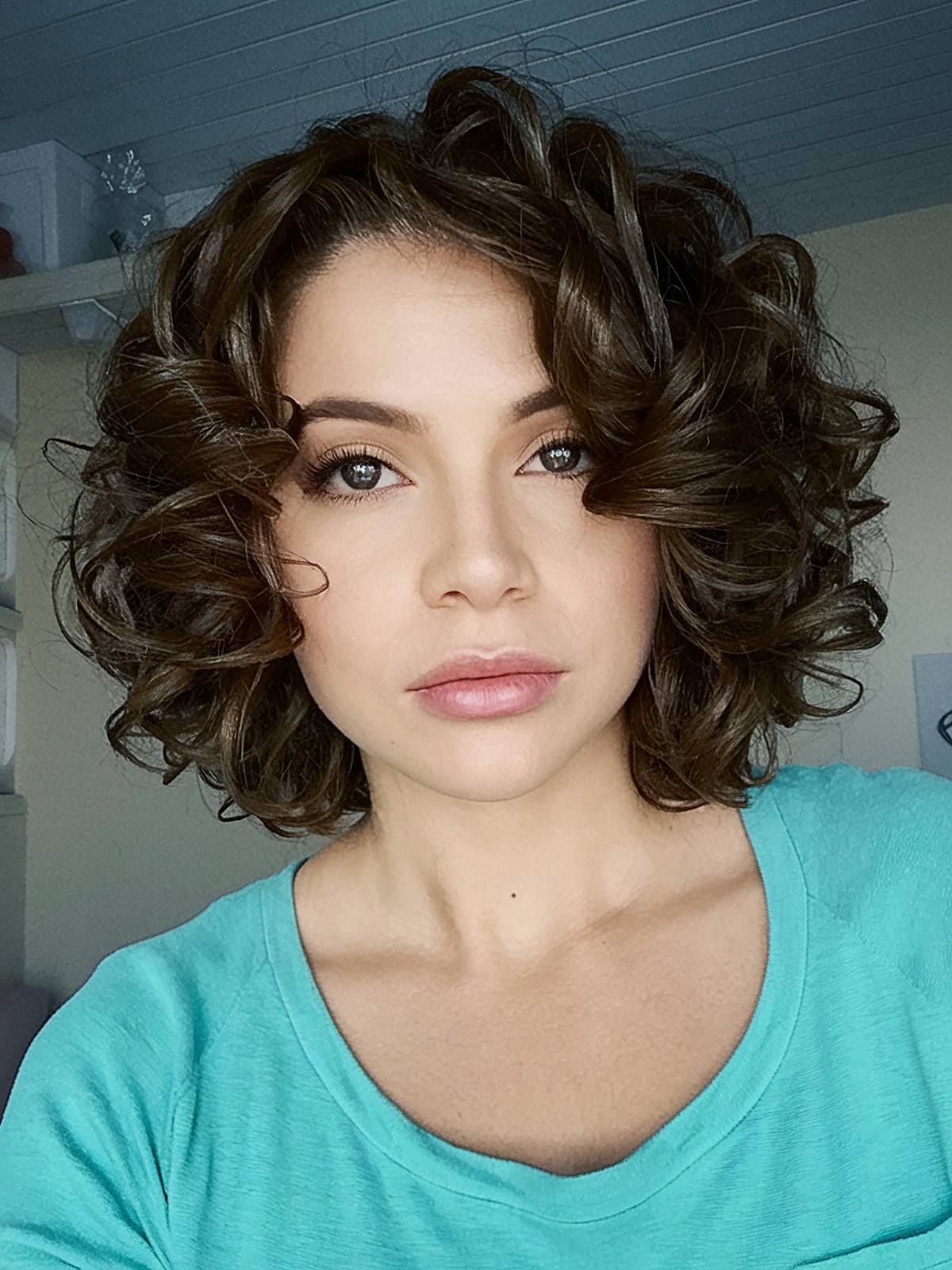 short curly hairstyle for women with high curl density