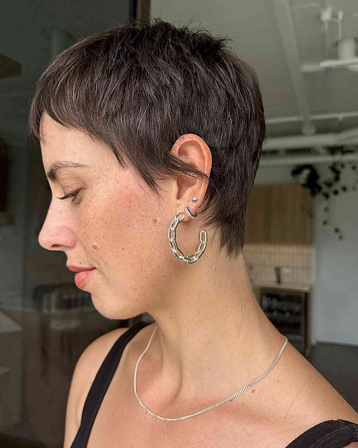 Short Dark Low-Maintenance Tapered Pixie with Soft Texture on Fine Hair