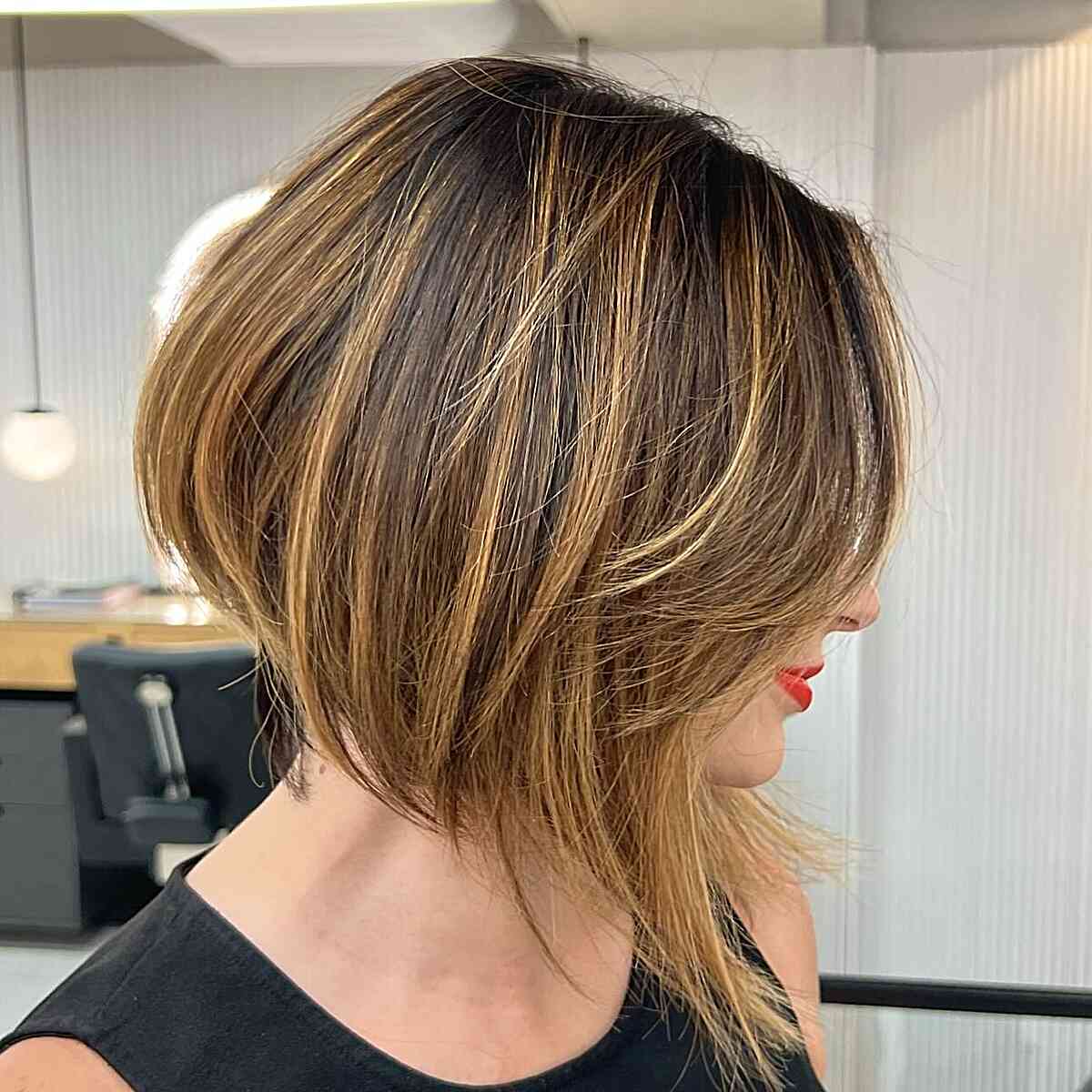 Short Dark-Rooted Dimensional Bob with Angled Layers for Thicker Hair