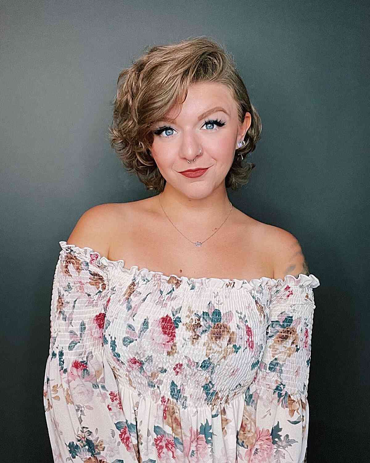 Short Deeply Side-Parted Curly Cut