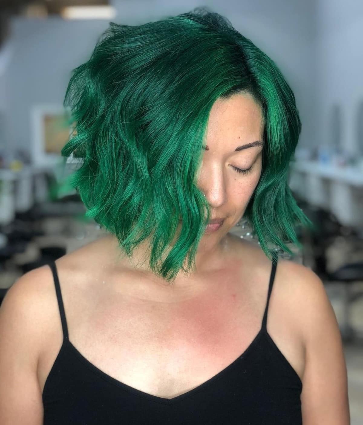 Short emerald green bob hairstyle