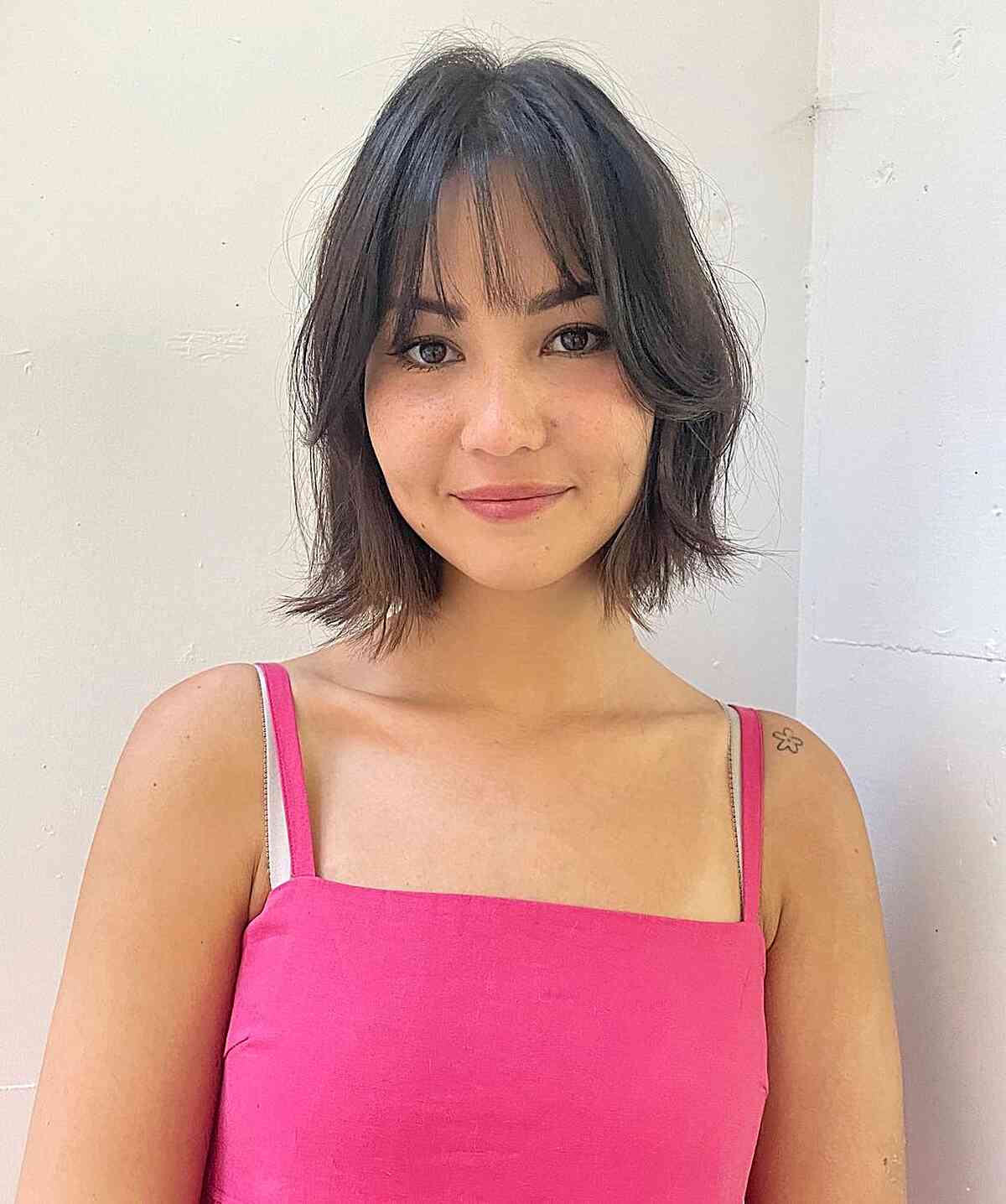 Short Face-Framing Soft Bob with Curtain Bangs for Fuller Faces