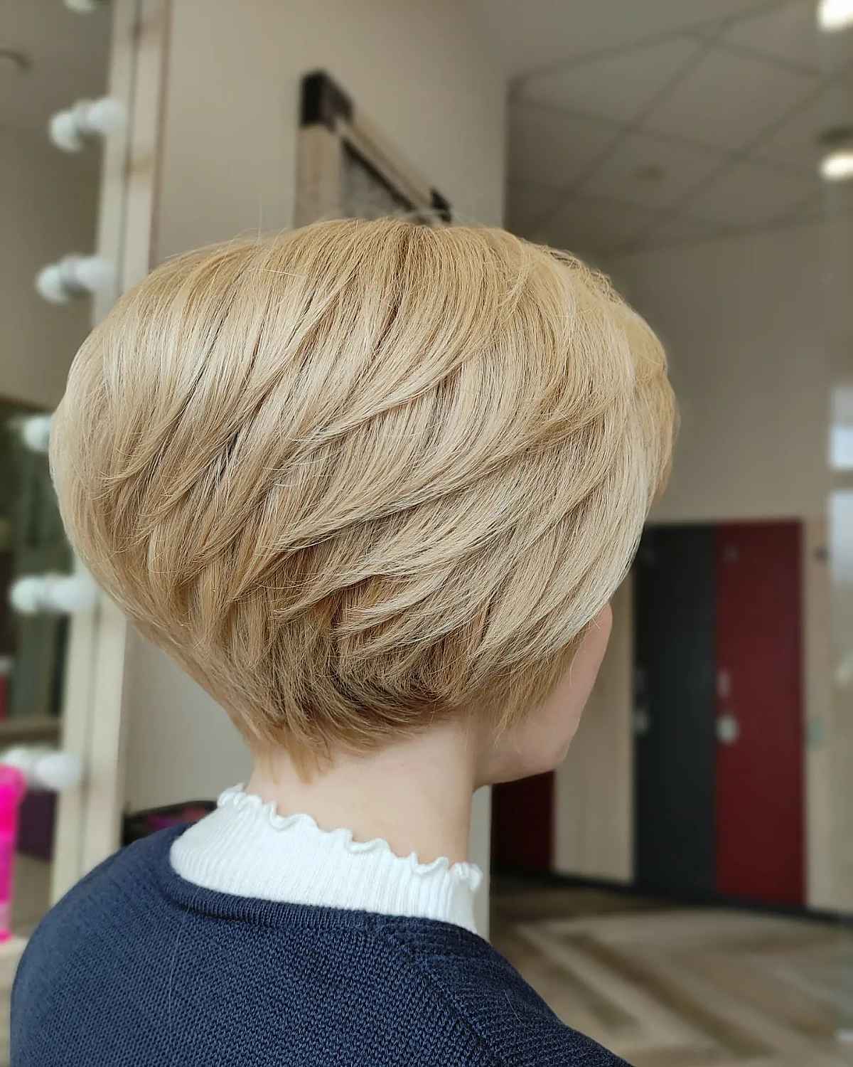 short feathered blonde bob hairstyle