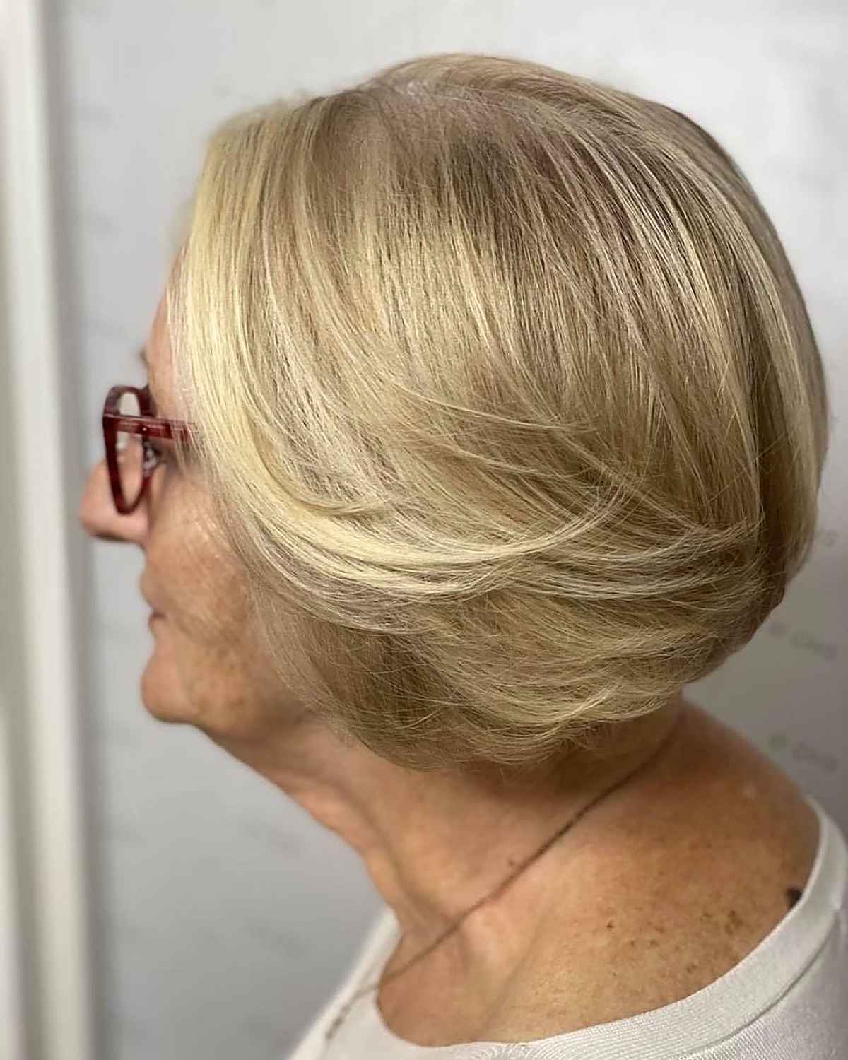 Short Feathered Bob on a women in her sixties
