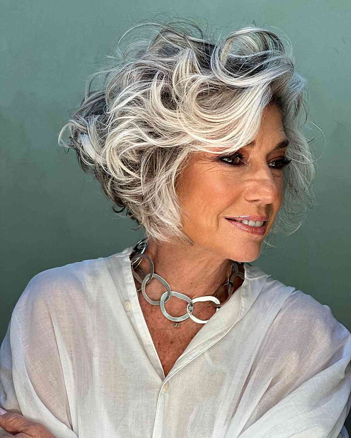 Short Feathered Bob with Silver Balayage for Ladies Aged 50