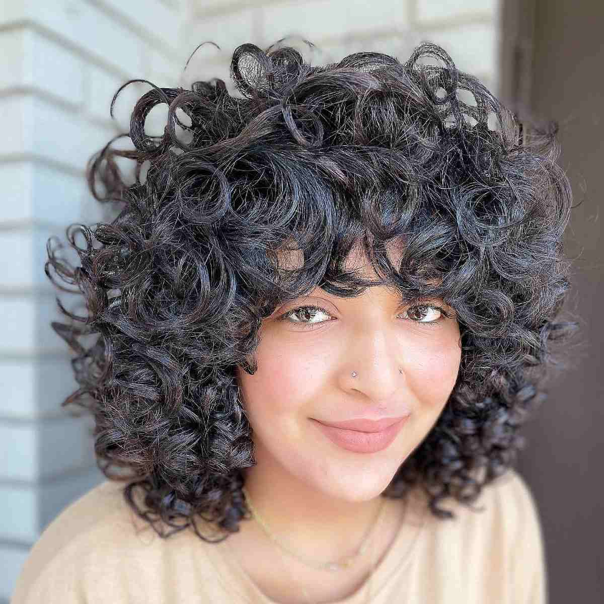 Short Fluffy Thick Curls and Fringe