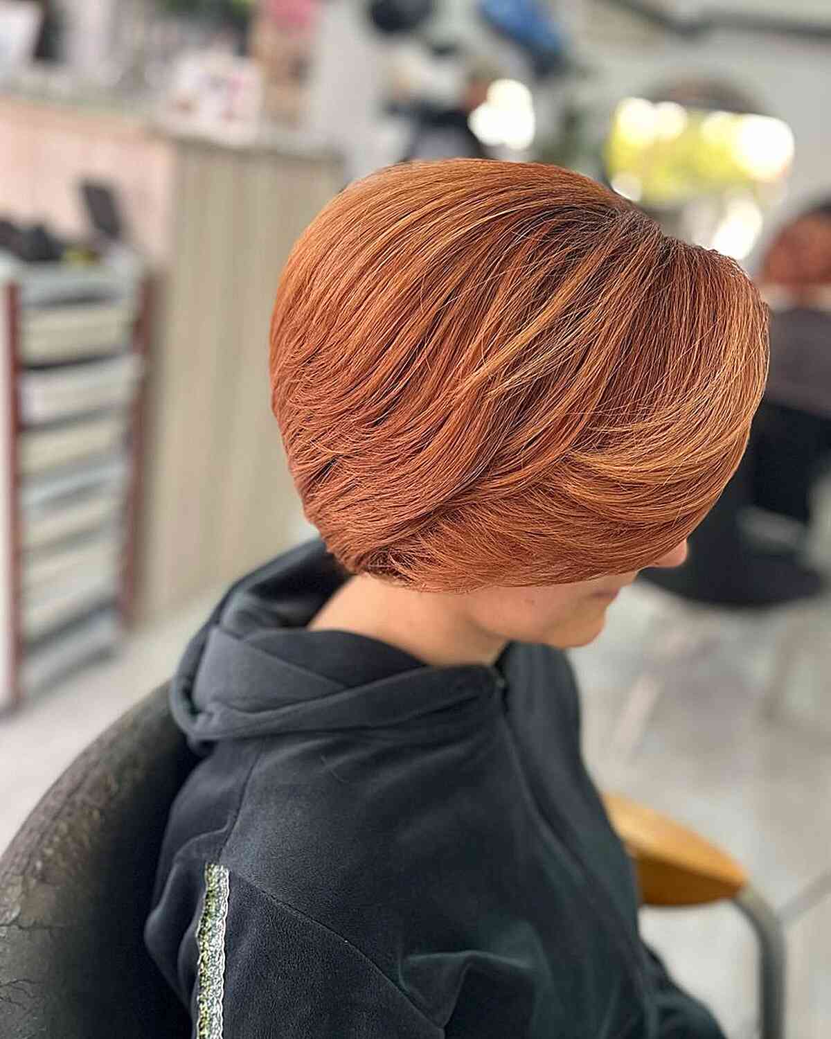 Short Ginger Round Bob with Subtle Butterfly Layers