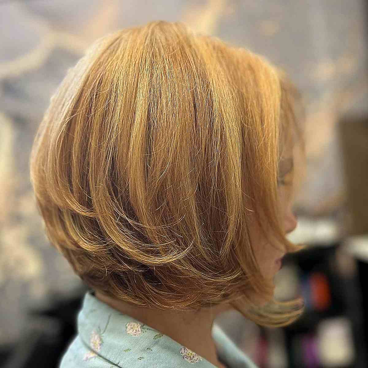 Short Golden Blonde Bob with Layered Swoopy Ends