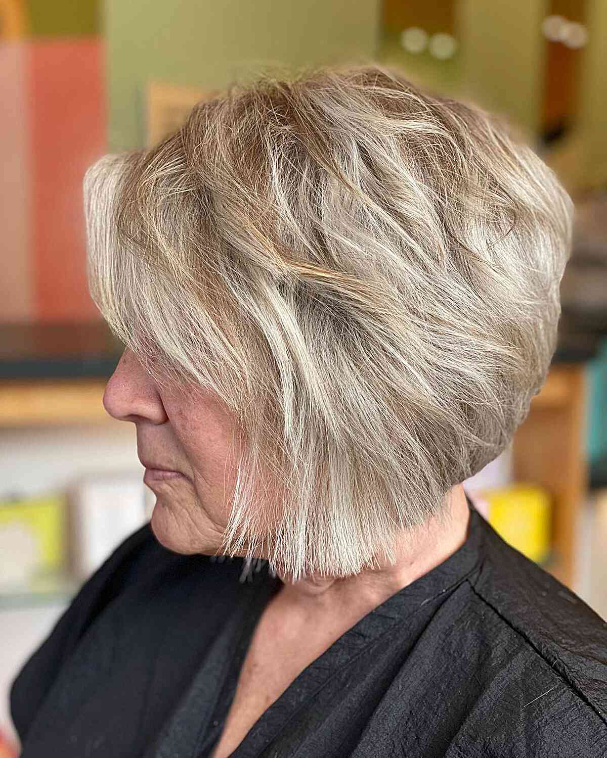Short Graduated Textured Bob with Crown Layers and Side Bangs for Older Women