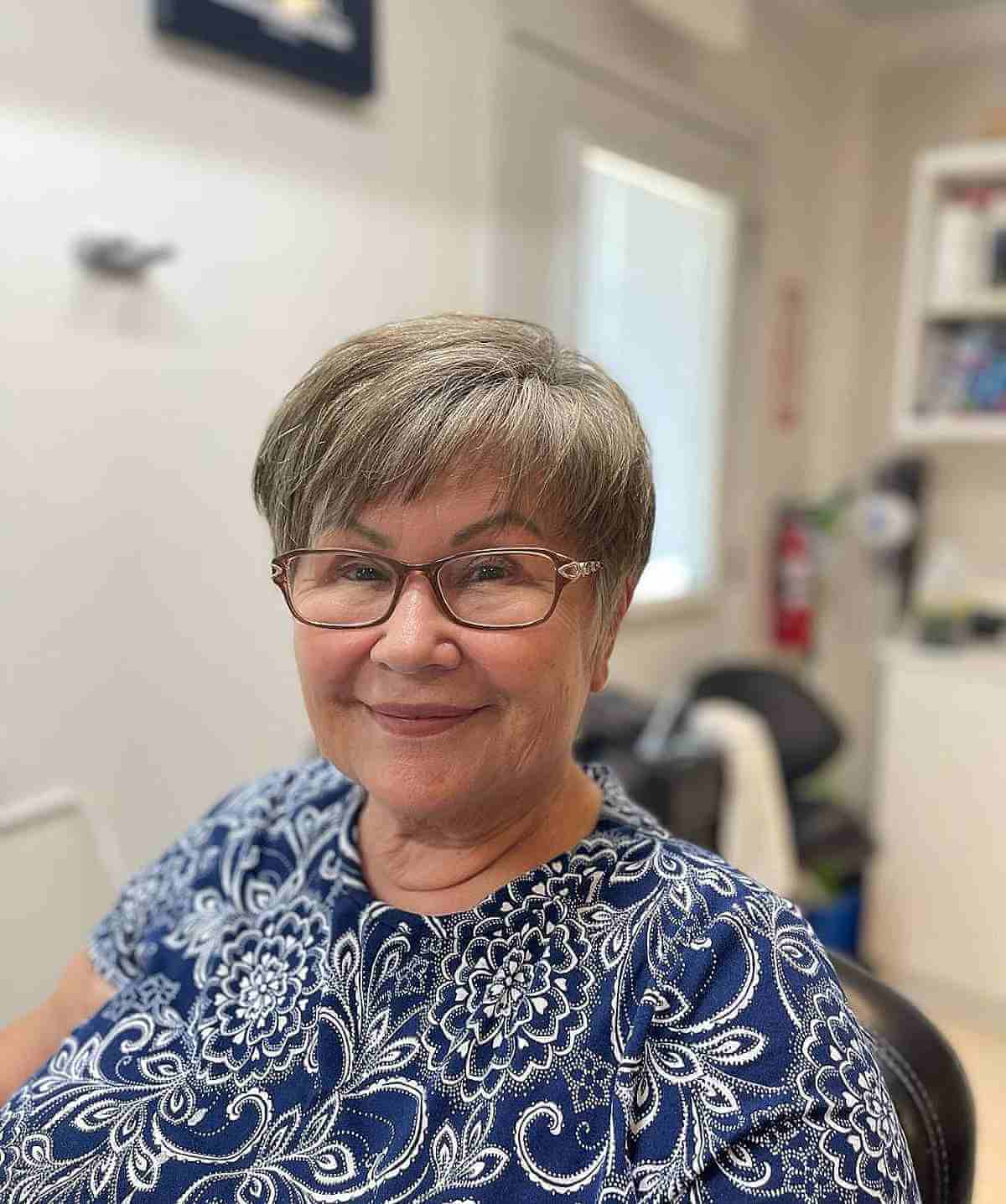 Short Gray Hair with Micro Bangs for a Woman in Her 50s