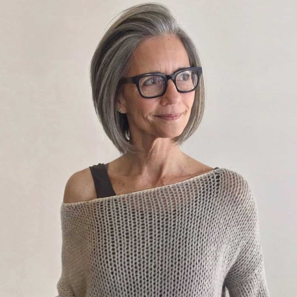 Short grey-haired bob for older women with glasses