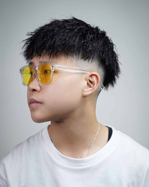A Spiky Hair with a Skin Fade for Teen Boys