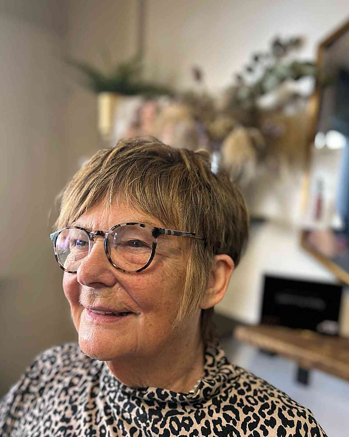 Short Hair with Soft Shag Pixie Cut and Curtain Bangs for Women with their 60s with Eyeglasses