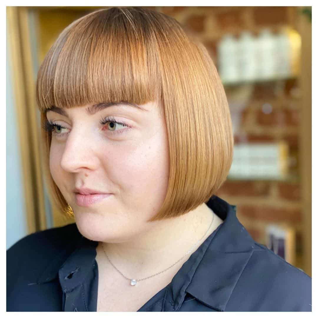 short hair with straight bangs for round faces