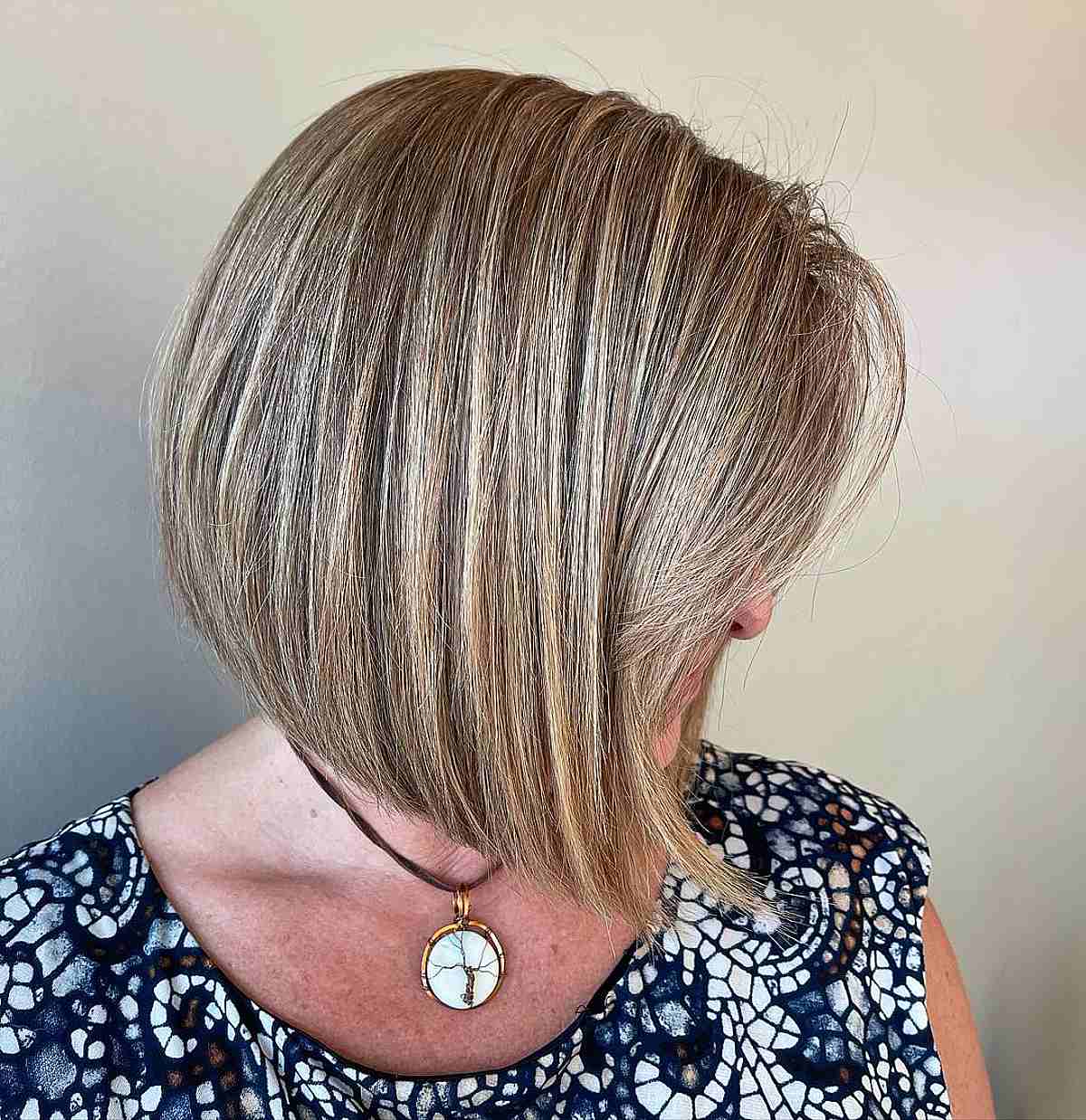 Short Highlighted Bob with Angled Layers for Older Women