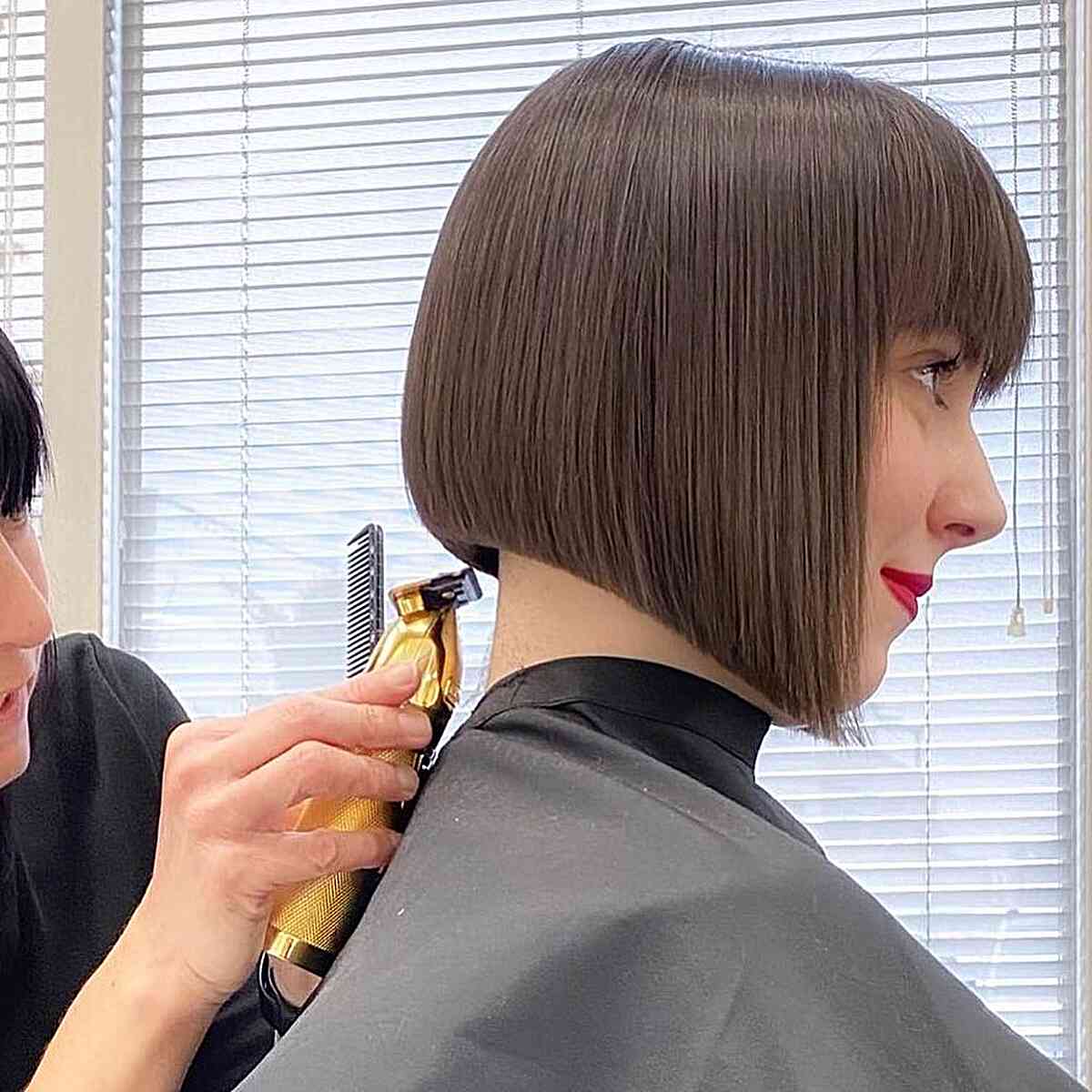 Short inverted bob with bangs hairstyle
