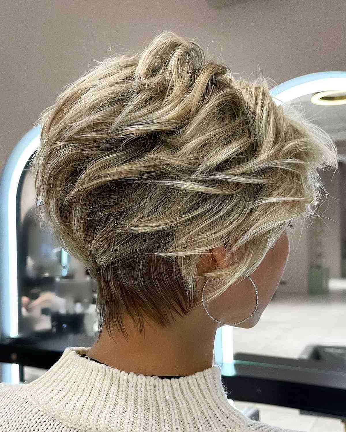 Short Layered Bixie with Blonde Highlights for Thick Hair