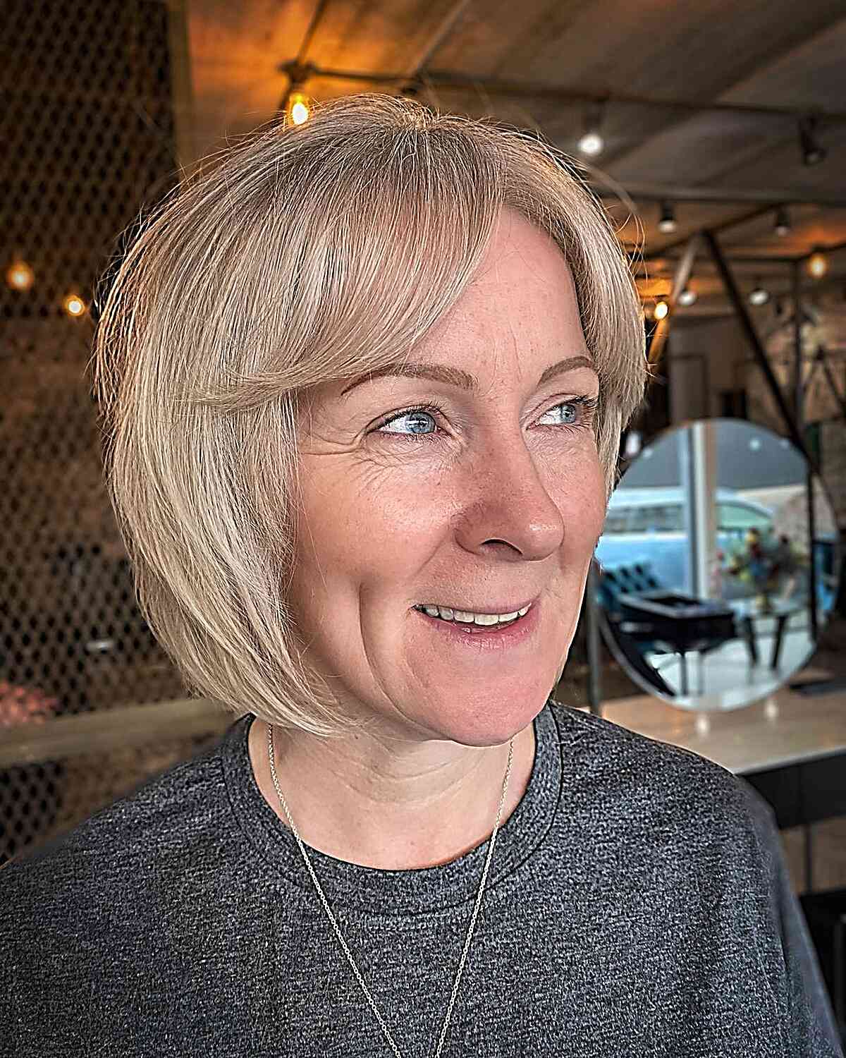 Short Layered Bob with Curtain Bangs for Older Women Past 50 with Fine Hair