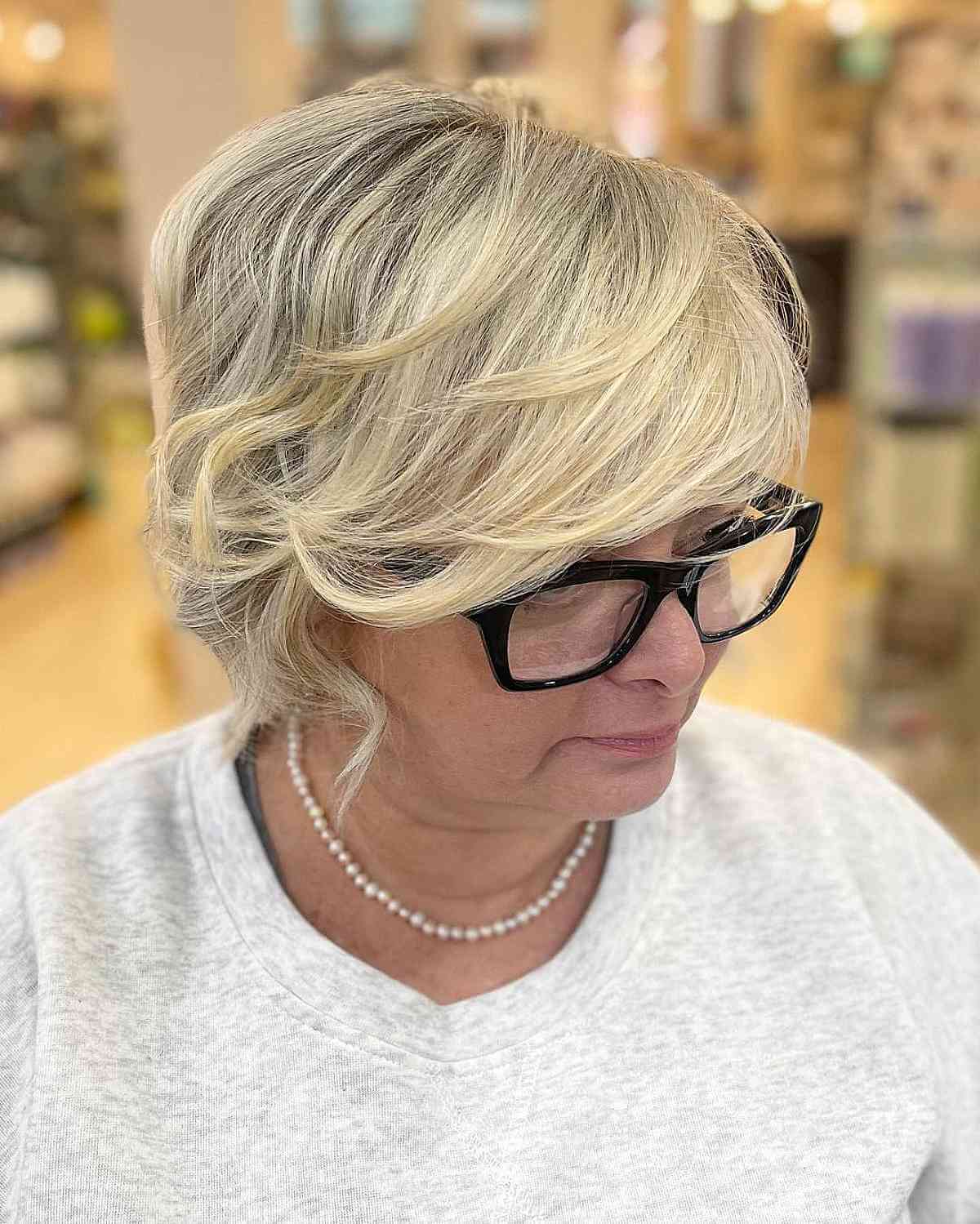 Short Layered Cut with Babylights for 50-Year-Olds with Glasses