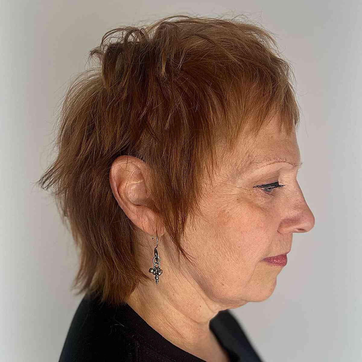 Short Layered Pixie Shag with High Crown Layers for 60-year-old Ladies