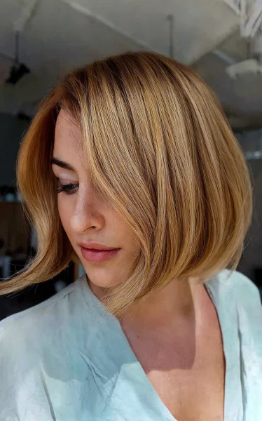 A Short-Length Blunt Golden Brown Bubble Bob
