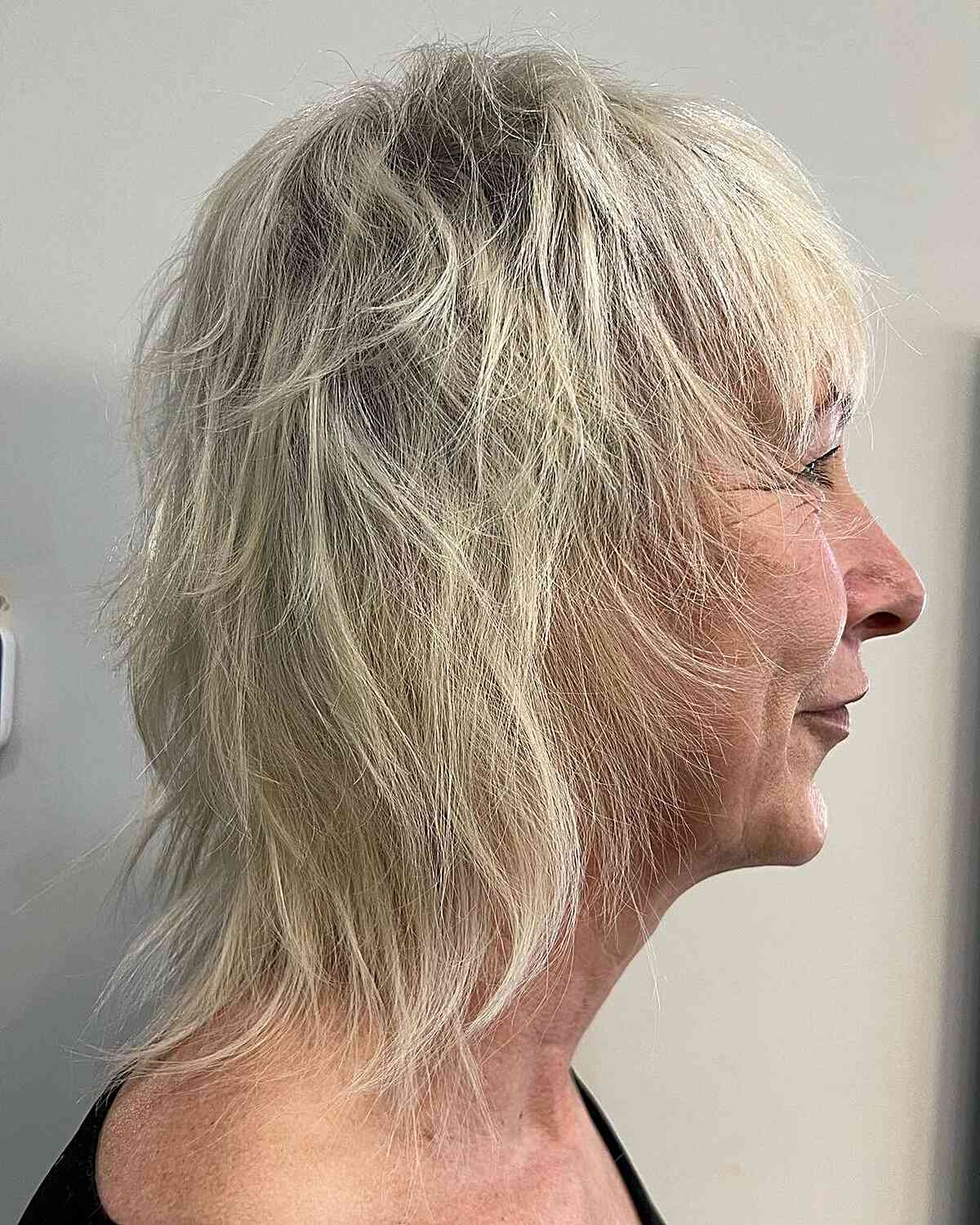 Short-Length Modern Mullet with Shaggy Layers for 60-year-old Ladies