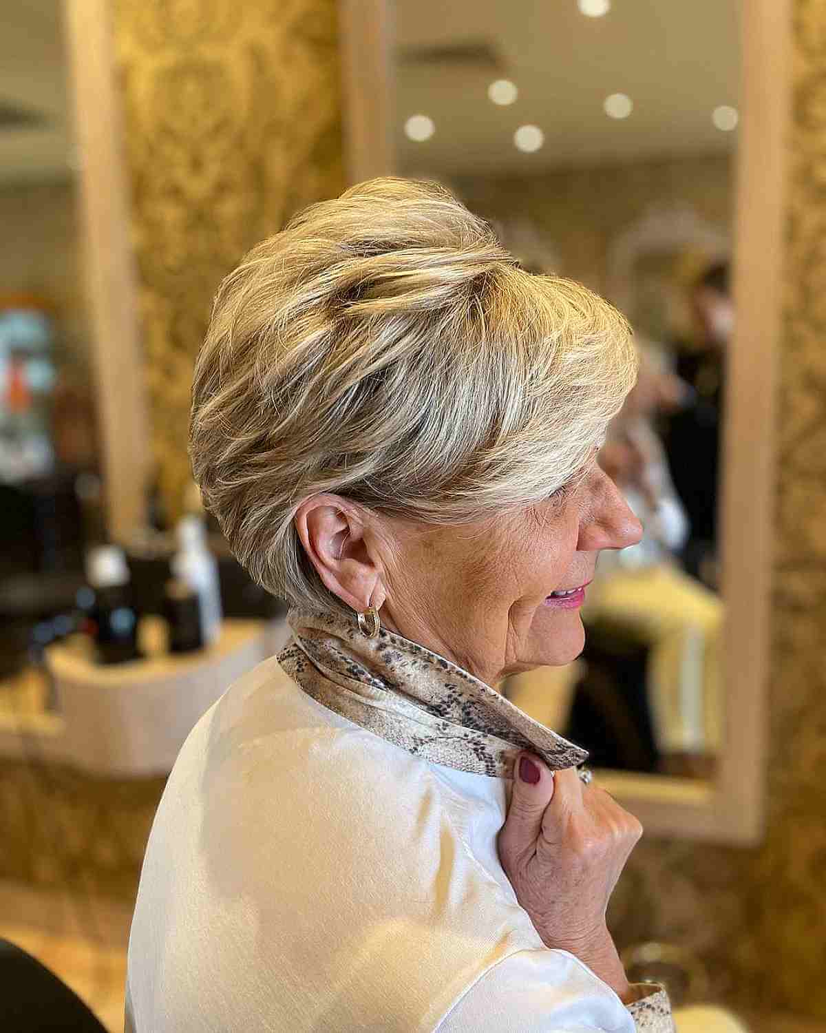 Feminine Short Long Blonde Pixie with Shorter Layers for Women in Their 60s
