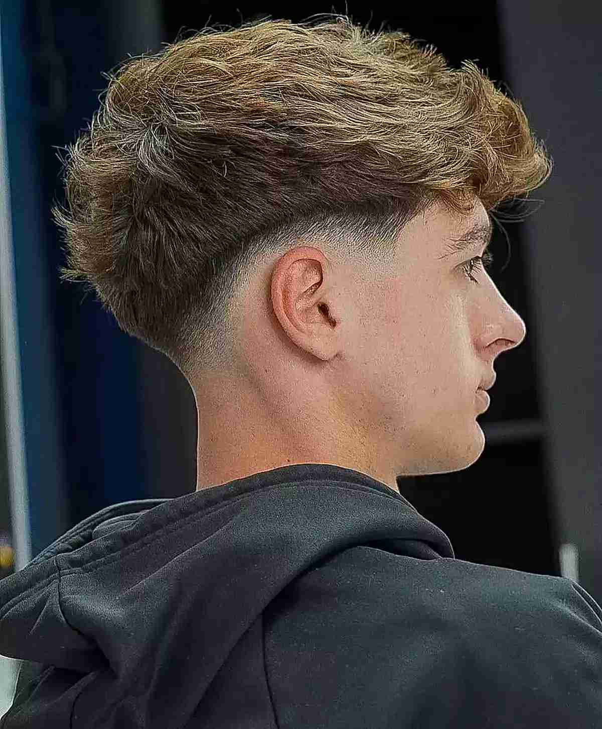 Short Low-Faded Choppy Haircut with Fringe for Young Men