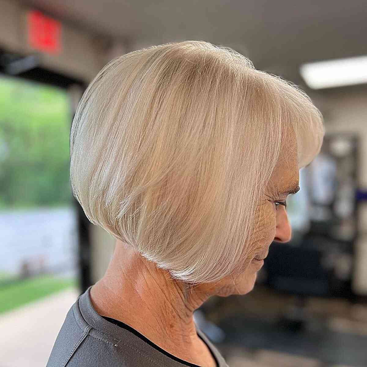 Short Low-Maintenance Bob Cut with Bangs for Mature Women Aged 70