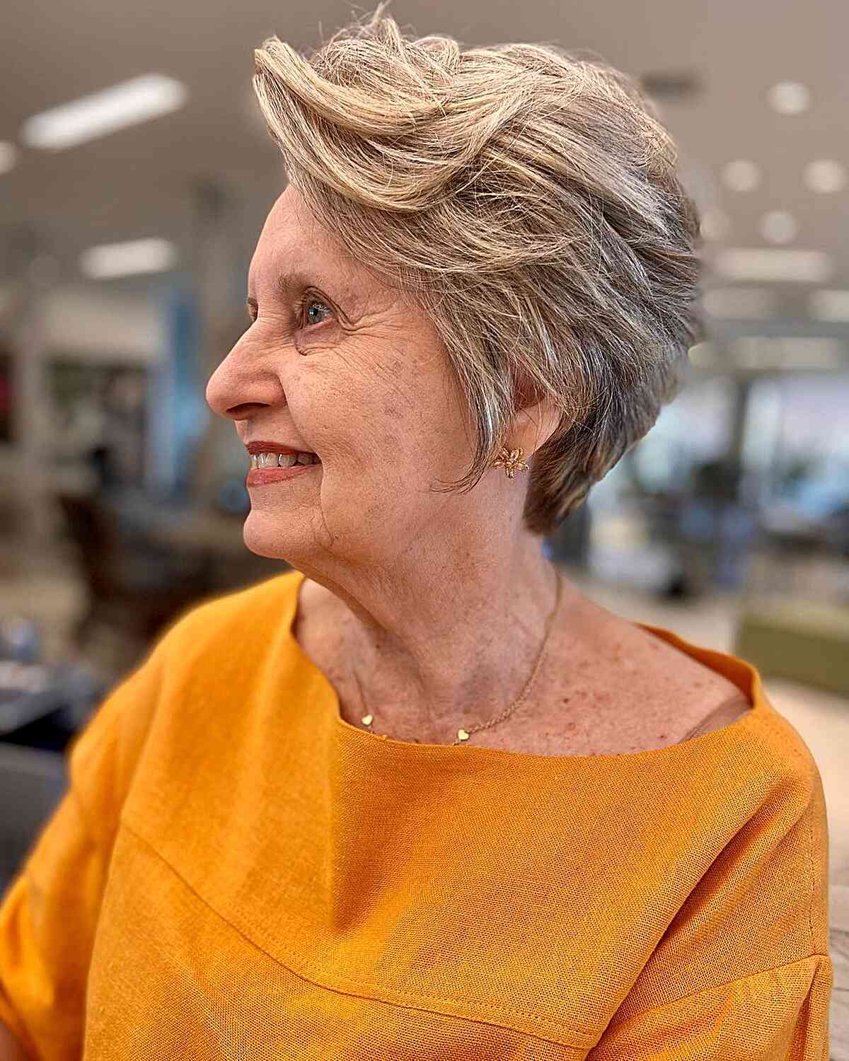 Short Modern Pixie with Choppy and Feathery Layers for women in their 60s