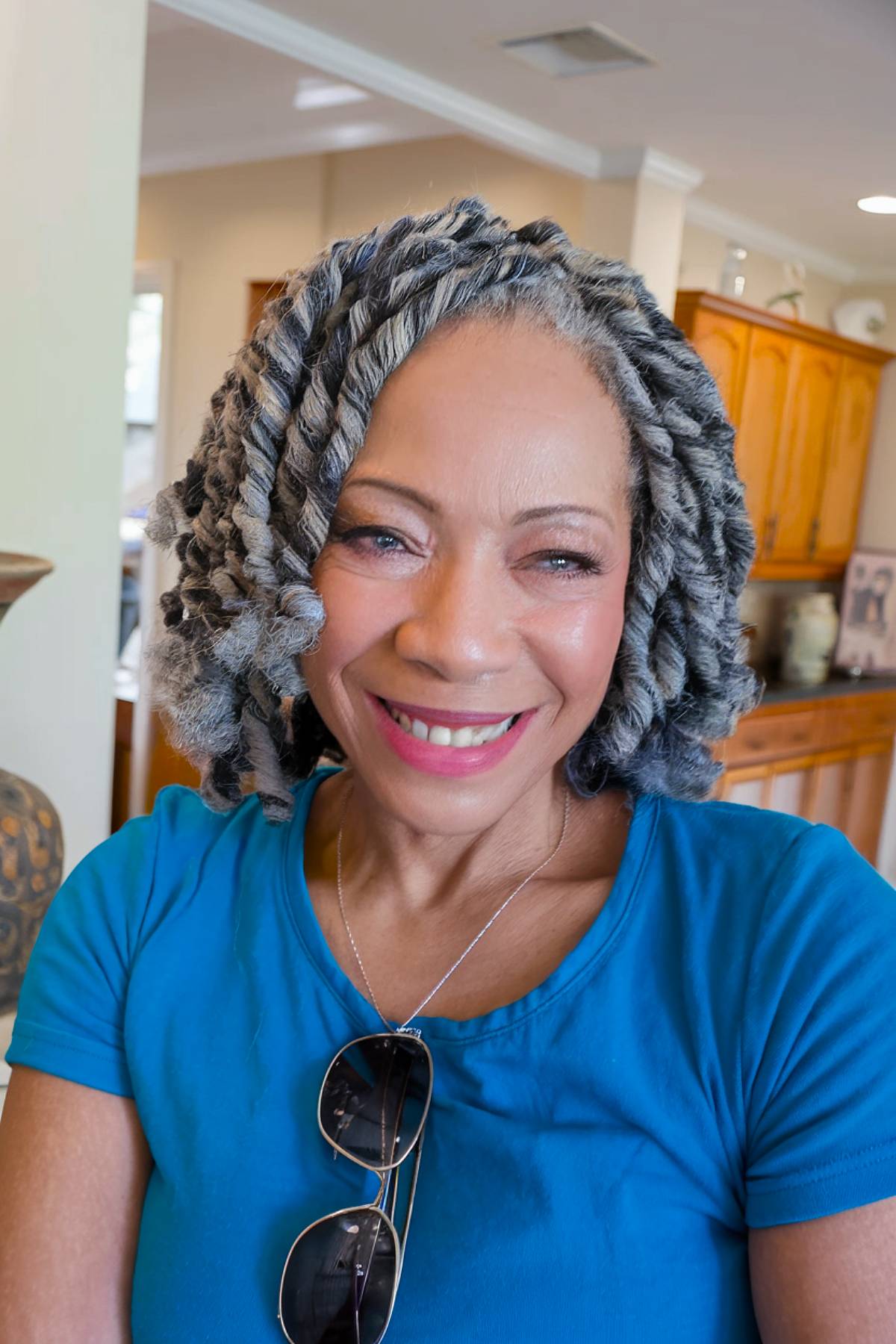 Short natural grey twist hairstyle for black women over 60